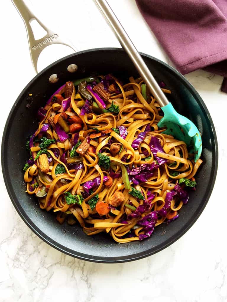 Vegan Mongolian noodles and veggies stir fry in spicy soy ginger sauce