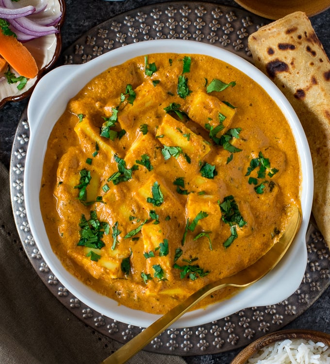 Paneer lababdar served in a white bowl.