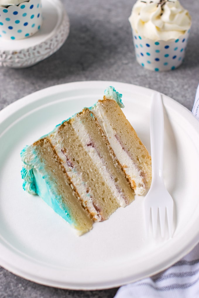 4 layer cake on a white plate