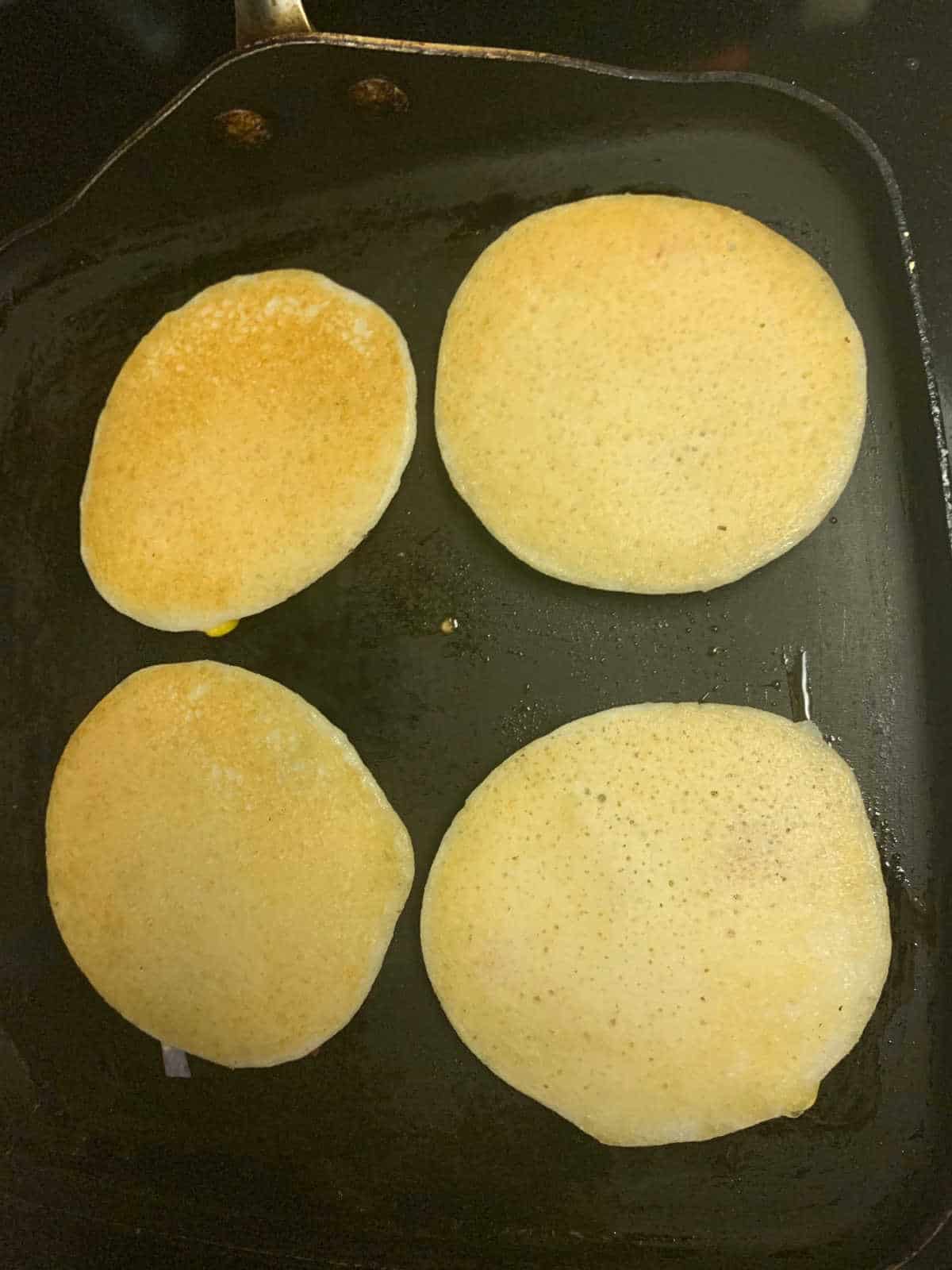 Mini uttapams flipped after cooked. 