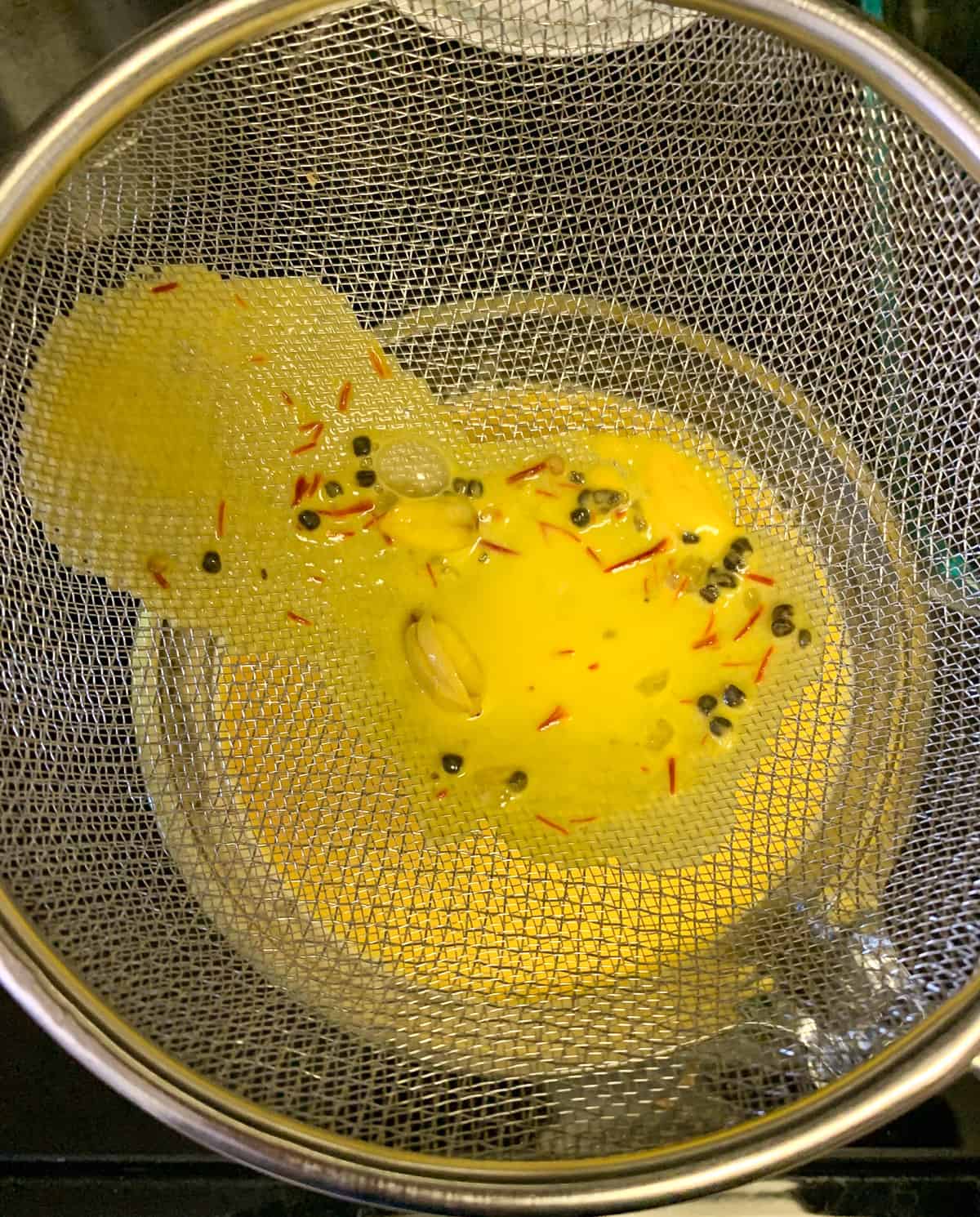 Passing the mixture through a sieve 