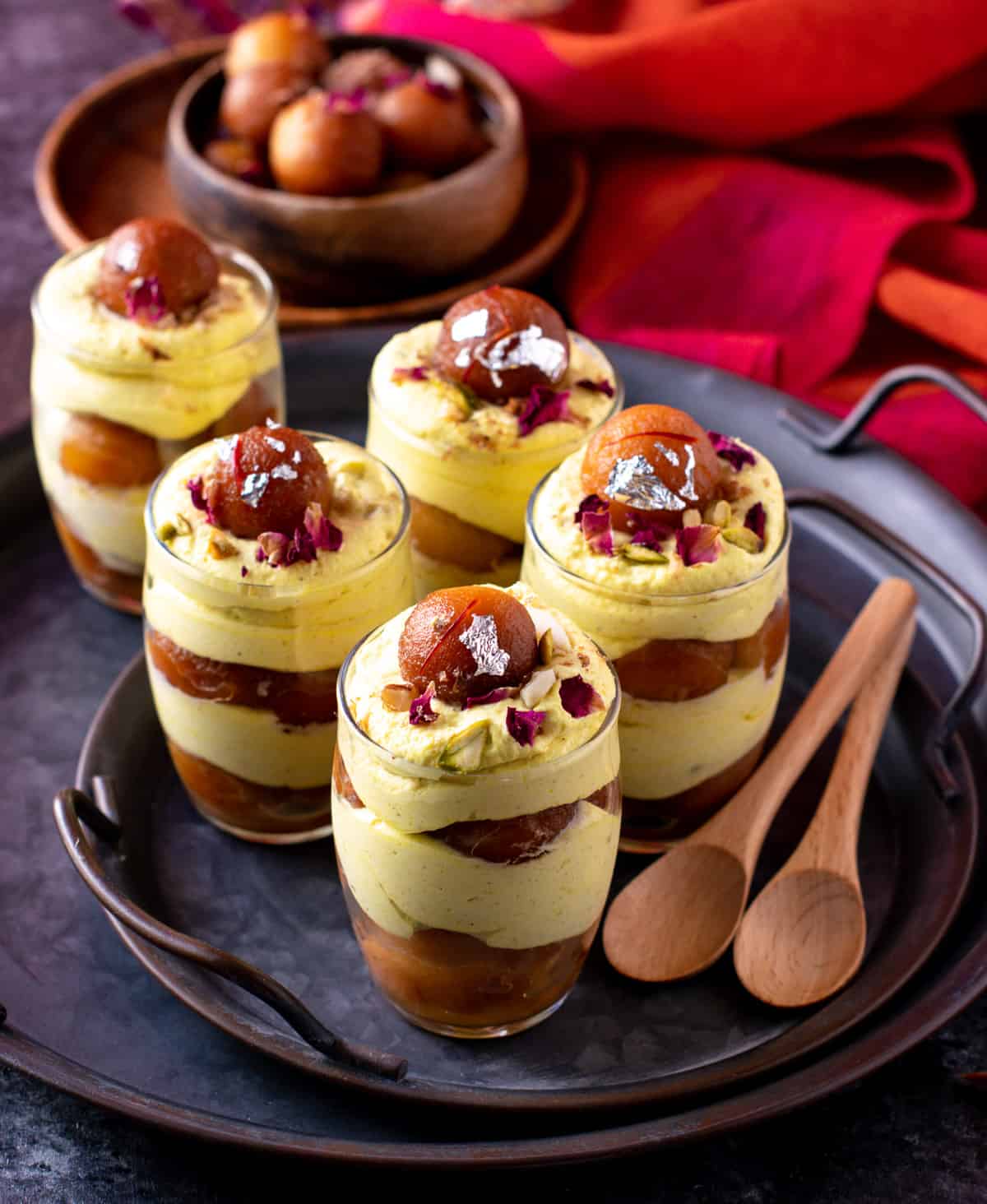 Gulab jamun thandai mousse served layered in glasses