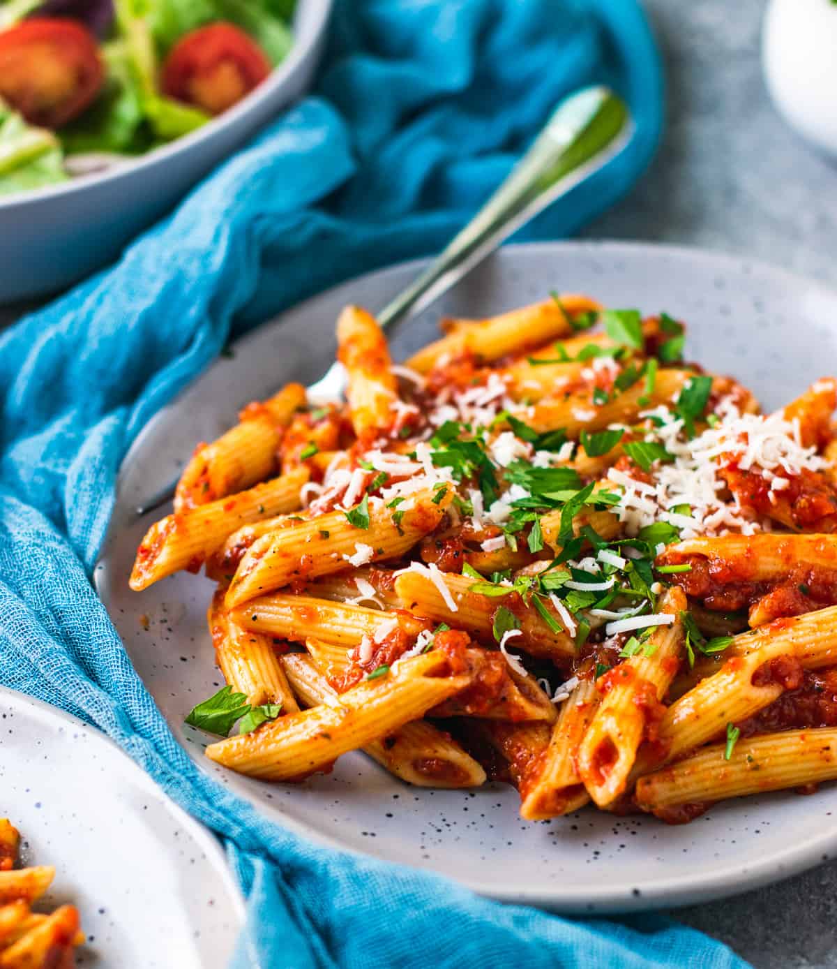 Roasted red pepper pasta sauce tossed with pasta and cheese