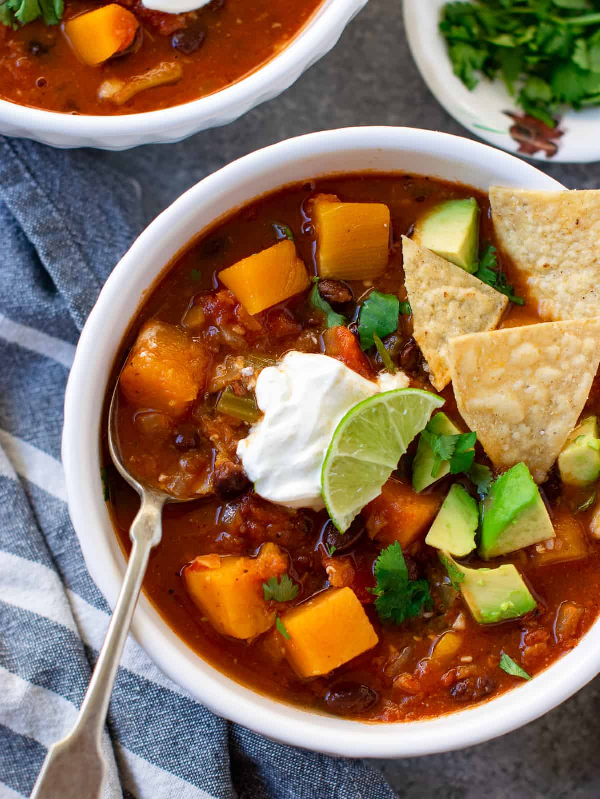 Vegan chili with butternut Squash topped with sour cream 