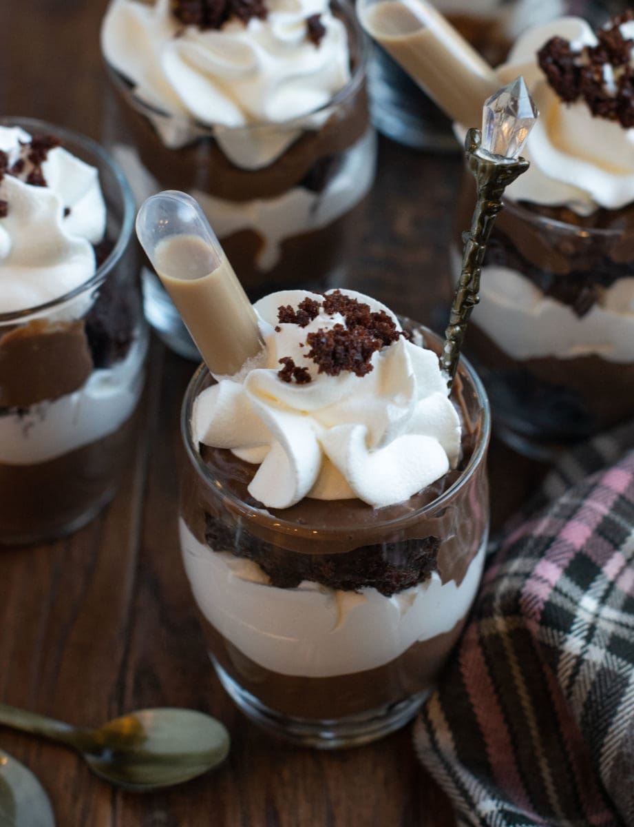 Boozy alcoholic dessert in a glass with spoon.