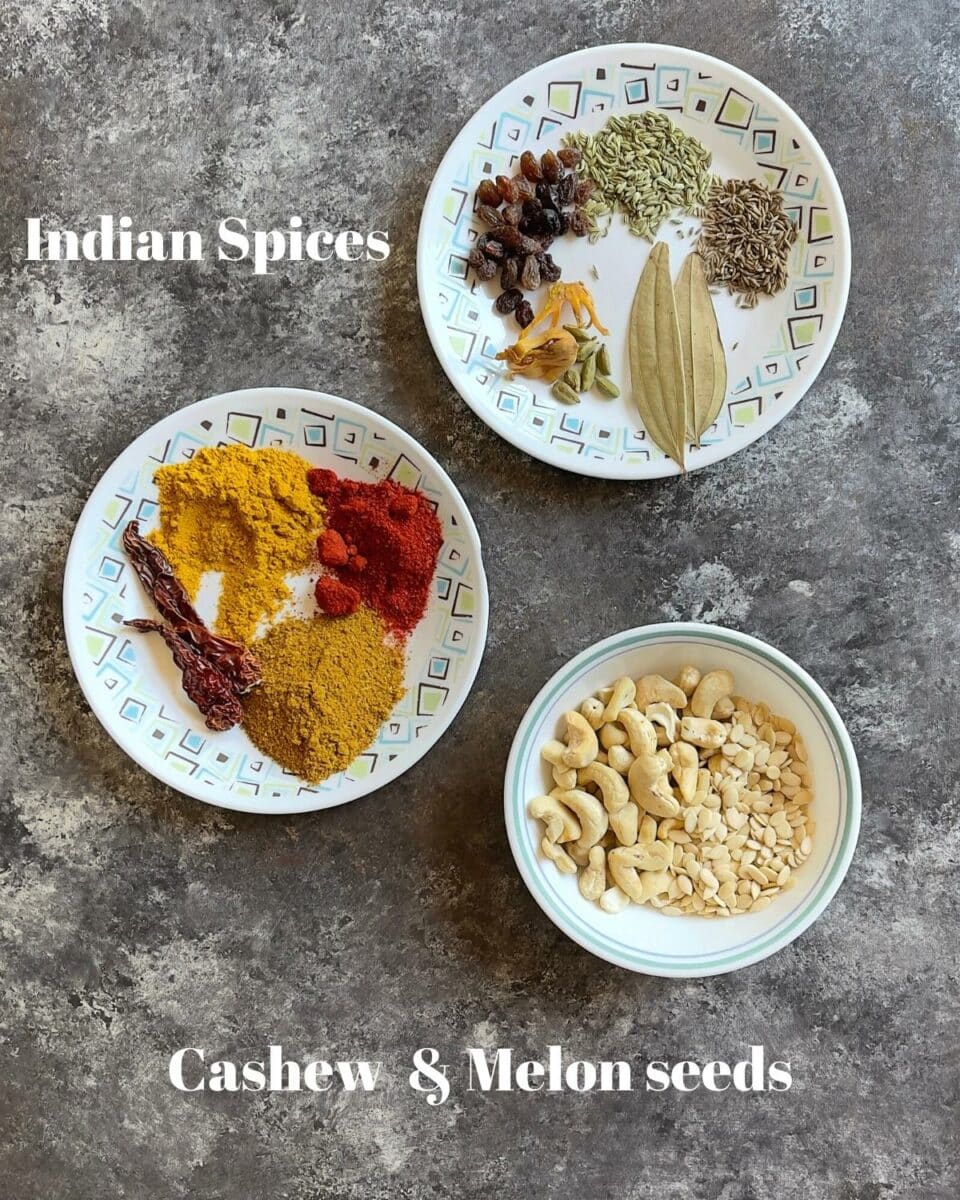Indian spices, cashew and melon seeds placed in bowls. 