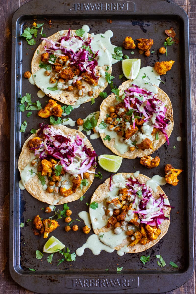 Tandoori Cauliflower Chickpea Tacos on a baking tray.
