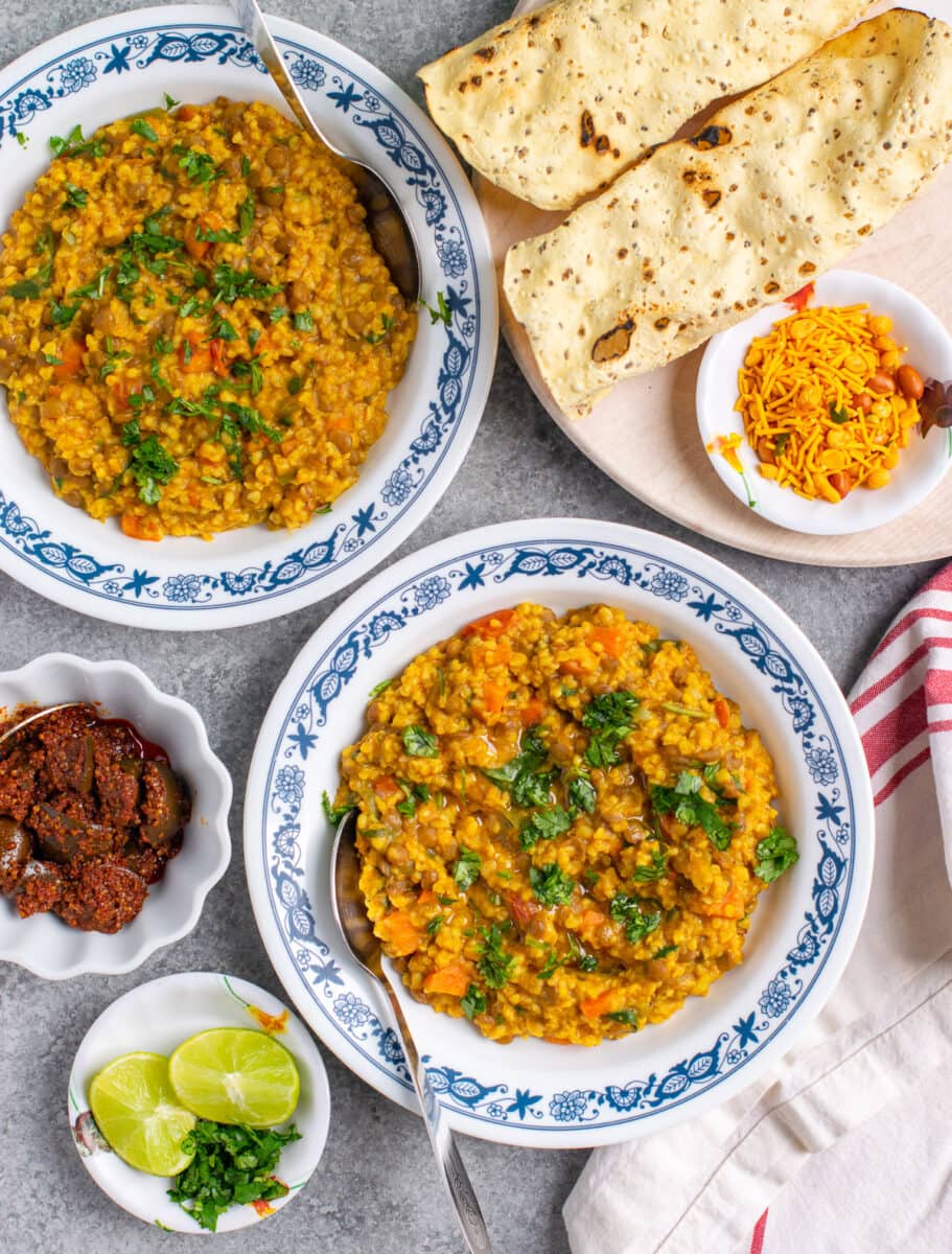 Masoor dal daliya khichdi made without rice and served with ghee on the top. 